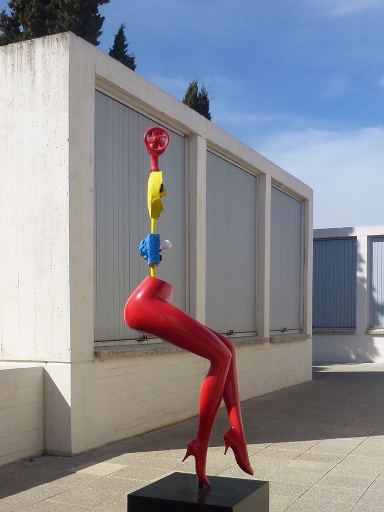 Joan Miro girl escaping sculpture