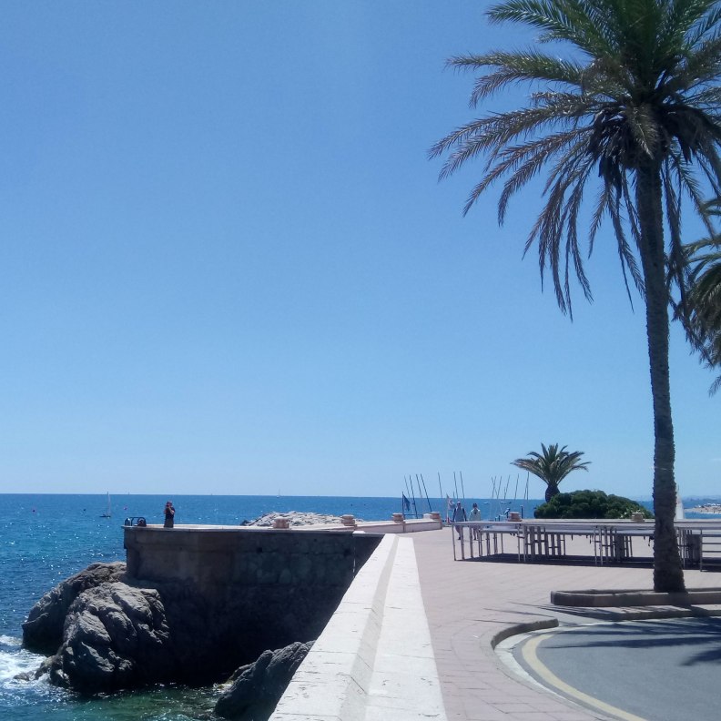 Sant Pol de Mar sea promenade palm trees